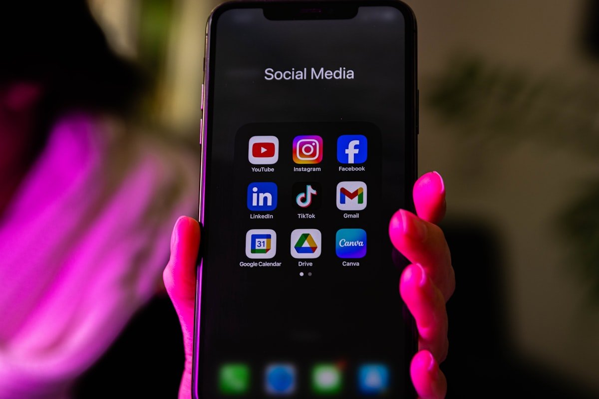 Smartphone showing social media apps including Instagram while troubleshooting app cache