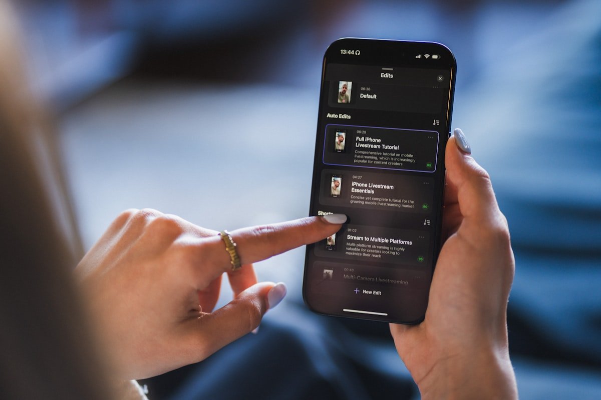 Person using a smartphone app while checking device settings